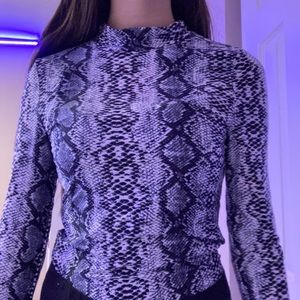 snakeskin long sleeve turtle neck